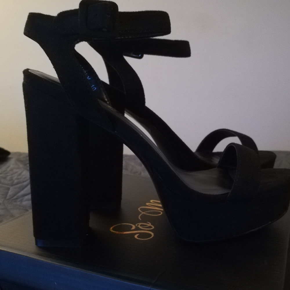 Brand new platform heel black sandals